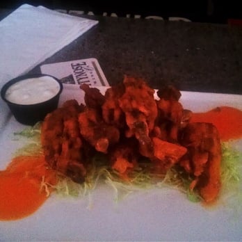 Nosh Kitchen Bar - Buffalo Pig Tails, a brief brush with heaven. - Sandwiches Near Me - Portland, Maine Nosh Kitchen Bar - Buffalo Pig Tails, a brief brush with heaven. - Sandwiches Near Me - Portland, Maine