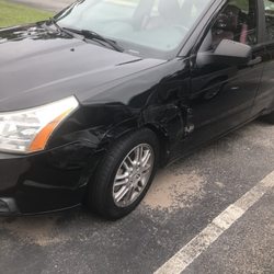 Caliber Collision - Clearer pic of the damage. That is the headlight that they said was cracked. Does it looked cracked? Lol