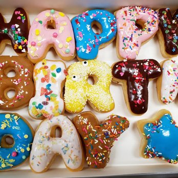 Howdy Donuts - a box of doughnuts - Donuts Near Me - Austin, Texas