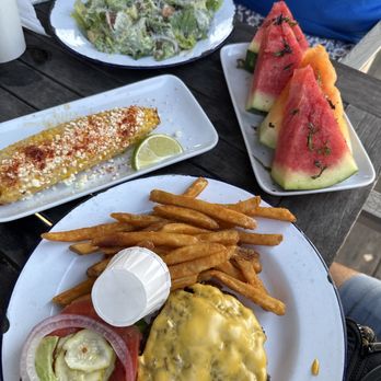 The Wyld Dock Bar - Yum. Cheese burger. Chili coated corn. Mellon. - New American Near Me - Savannah, Georgia The Wyld Dock Bar - Yum. Cheese burger. Chili coated corn. Mellon. - New American Near Me - Savannah, Georgia