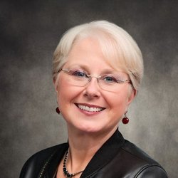 Riverbend Dental - Things change as the years pass by - glasses and a new haircut!