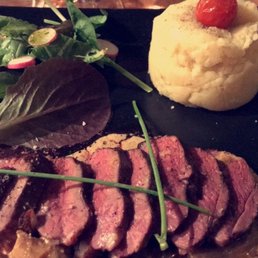 duck, cooked medium. also comes with mashed potatoes and a salad!