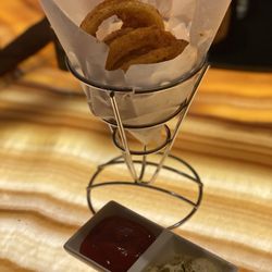 Elway's - Onion rings.  Not really hot enough.