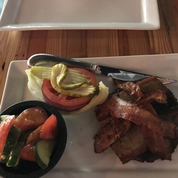 Engine No 9 - Bokor with no bun. Cucumber and tomato salad as side. - Burgers Near Me - Saint Petersburg, Florida
