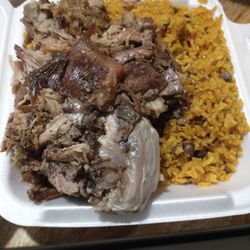 Latino Grocery Spanish Food - $9 gets you all of this! Roast pork and rice. So tasty!