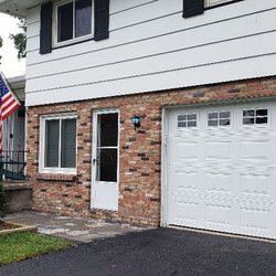 Monroe Overhead Door Company - This is the after. What a difference with a new door installed by Monroe Overhead Door Co.