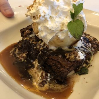Harry & Izzy's - Brownie. Served with pecans. - Steakhouses Near Me - Indianapolis, Indiana Harry & Izzy's - Brownie. Served with pecans. - Steakhouses Near Me - Indianapolis, Indiana