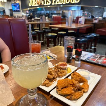 Johnny Carino's - Calamari, Cajun 6 Wings & Johnny's Margarita (On the Rocks) - Margaritas "happy Hour" - Italian Near Me - Modesto, California Johnny Carino's - Calamari, Cajun 6 Wings & Johnny's Margarita (On the Rocks) - Margaritas "happy Hour" - Italian Near Me - Modesto, California