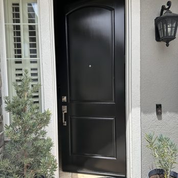 Lifestyle Painting  - The beautiful after! The door is so smooth and shiny! And the door step plate/threshold is all black! - Painters Near Me