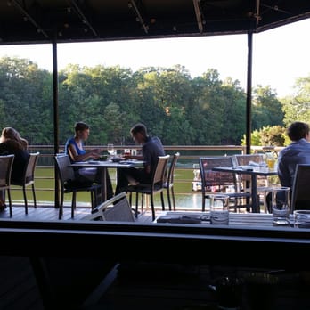 Red's Table - Outdoor seating overlooking a lake. - New American Near Me - Reston, Virginia