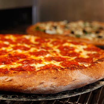 Chanello's Pizza - two pizzas on a rack - Pizza Near Me - Virginia Beach, Virginia Chanello's Pizza - two pizzas on a rack - Pizza Near Me - Virginia Beach, Virginia