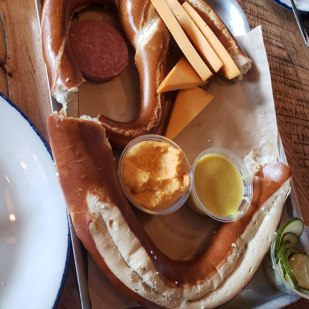 Already started eating pretzel with charcuterie. Already started eating pretzel with charcuterie.