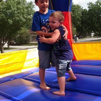 Let's Party Inflatables - Having fun playing in the bounce house! - Home & Garden Near Me