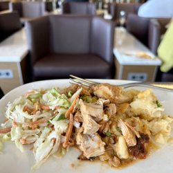 Delta Sky Club - Savory Chicken Thighs, Coleslaw, and 3 Cheese Mac-n-Cheese.