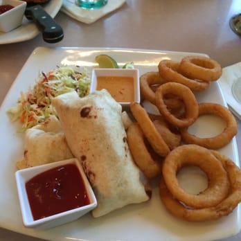 M.A.C. 24/7 - Fish burrito with asian slaw and a side of onion rings - American Near Me - Honolulu, Hawaii