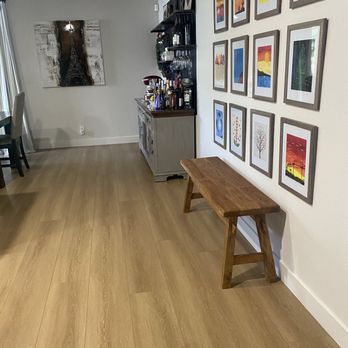 Most Valuable Restoration - new floors and baseboard after reno - Flooring Near Me