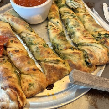 The Brick - Stuffed Cheese and Spinach Bread Sticks and Marinara Sauce. - Pizza Near Me - Macon, Georgia The Brick - Stuffed Cheese and Spinach Bread Sticks and Marinara Sauce. - Pizza Near Me - Macon, Georgia