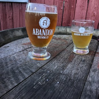 Abandon Brewing Company - two glasses of beer on a barrel - Breweries Near Me - Penn Yan, New York Abandon Brewing Company - two glasses of beer on a barrel - Breweries Near Me - Penn Yan, New York