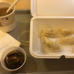 Foova - Veggie steamed dumplings (3 eaten) and miso while I wait for our to-go order. Delish!!!