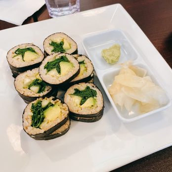 Amitabul - a plate of sushi and a bowl of chips - Vegan Near Me - Chicago, Illinois