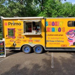 a food truck parked in a parking lot