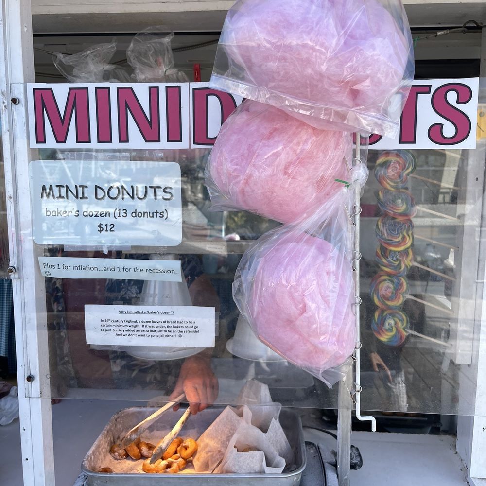 Sweets - a display case with a bag of cotton candy - Donuts Near Me - Victoria, British Columbia