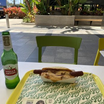 Tiny’s - Tiny's chili cheese hotdog and a nicely chilled Stella! - Burgers Near Me - Costa Mesa, California Tiny’s - Tiny's chili cheese hotdog and a nicely chilled Stella! - Burgers Near Me - Costa Mesa, California