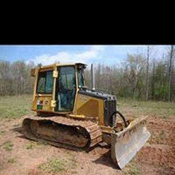 Tippens Clearing & Grading - a bulldozer in a field - Gardeners Near Me Tippens Clearing & Grading - a bulldozer in a field - Gardeners Near Me