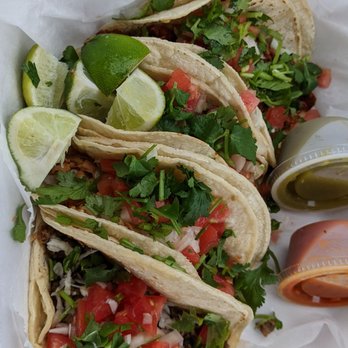 Manny's Tacos To Go - three tacos in a styrofoam container - Mexican Near Me - Sarasota, Florida