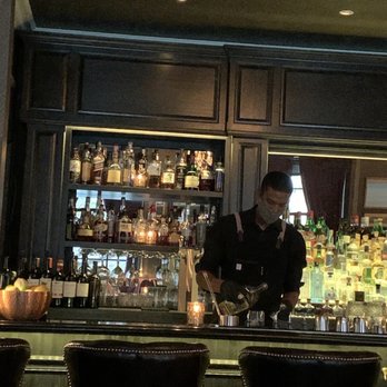 P.S. Steak - Beautiful bar with a masked up bartender making delicious cocktails. - Steakhouses Near Me - Minneapolis, Minnesota P.S. Steak - Beautiful bar with a masked up bartender making delicious cocktails. - Steakhouses Near Me - Minneapolis, Minnesota
