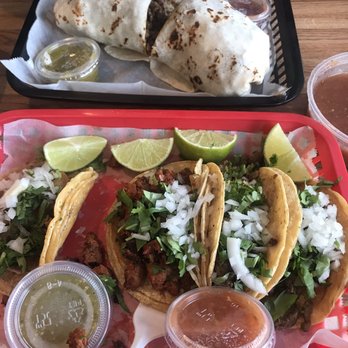 Los Primos Mexican Grill - Cali burrito and assorted tacos - Mexican Near Me - Davenport, Iowa