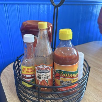 Tacos Uno - Hot sauce variety on the table - Tacos Near Me - St. Louis, Missouri Tacos Uno - Hot sauce variety on the table - Tacos Near Me - St. Louis, Missouri