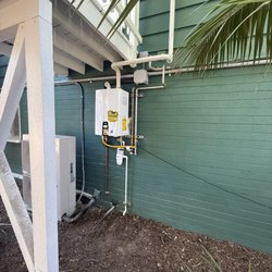 Everyday Water Heaters - Transformative results. The old mess is gone, the new tankless install with relocation to the exterior! ONE CALL FIXES IT ALL!