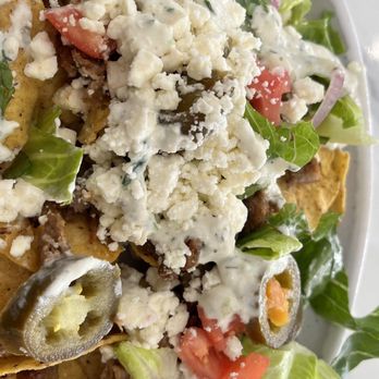 Mejana Mediterranean Grille - Nachos with gyro meat - Mediterranean Near Me - Orlando, Florida Mejana Mediterranean Grille - Nachos with gyro meat - Mediterranean Near Me - Orlando, Florida