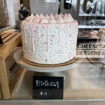 Eat Cake  -  birthday cake on display in a bakery - Desserts Near Me - Houston, Texas