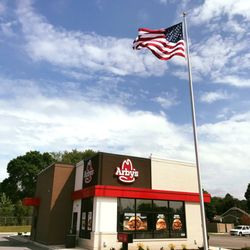 Fly Me Flag - We sell and install commercial flagpoles, like this 50 ft. pole installed for a local business.