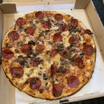 Yaghi's New York Pizzeria - 14" pepperoni, sausage and mushroom pizza - Pizza Near Me - Pflugerville, Texas Yaghi's New York Pizzeria - 14" pepperoni, sausage and mushroom pizza - Pizza Near Me - Pflugerville, Texas