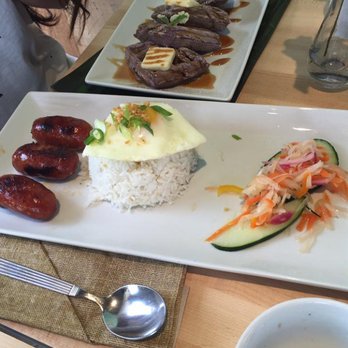 Bonifacio - Tocino, a Sweet and savory cured pork, similar to thick cut bacon, served with sunny side up egg, garlic fried rice, and side of Arroz Caldo - Filipino Near Me - Columbus, Ohio