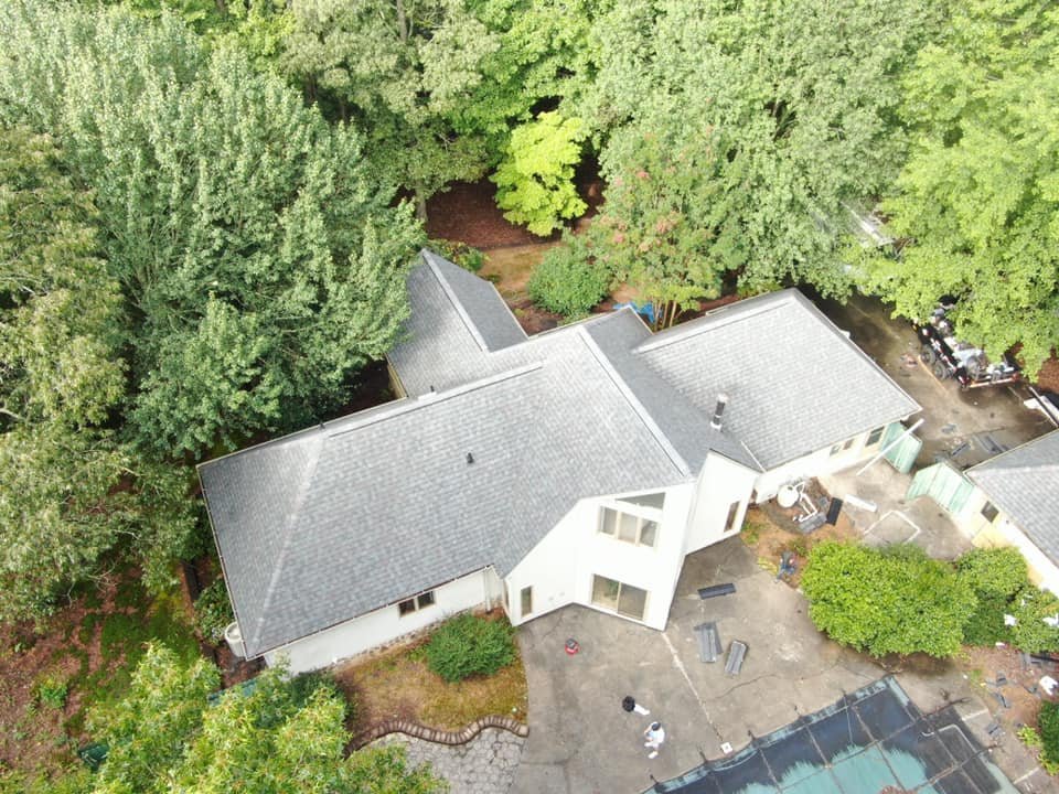 Slide of AMI Roofing