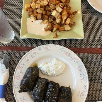 Pom & Olive - Spicy Garlic Potato and Dolmades - Mediterranean Near Me - Costa Mesa, California Pom & Olive - Spicy Garlic Potato and Dolmades - Mediterranean Near Me - Costa Mesa, California