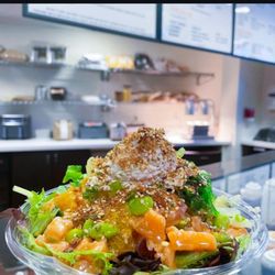Brilliantly stuffed up pick 2 bowl topped with Kani salad and mandarin oranges