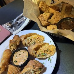 Shadow Lounge & Restaurant - Southwest egg rolls and salmon bites.