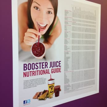 Booster Juice - a woman eating a bowl of fruit - Juice Bars & Smoothies Near Me - Airdrie, Alberta Booster Juice - a woman eating a bowl of fruit - Juice Bars & Smoothies Near Me - Airdrie, Alberta