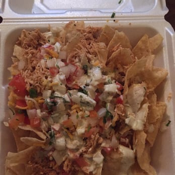Fuzzy's Taco Shop - Shredded chicken nachos to go (queso comes on the side) - Mexican Near Me - Carrollton, Texas Fuzzy's Taco Shop - Shredded chicken nachos to go (queso comes on the side) - Mexican Near Me - Carrollton, Texas