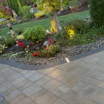 Diamond Touch Landscape & Construction - a pathway leading to a garden - Landscaping Near Me Diamond Touch Landscape & Construction - a pathway leading to a garden - Landscaping Near Me