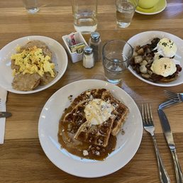 Biscuits and gravy, waffles, and eggs Benedict