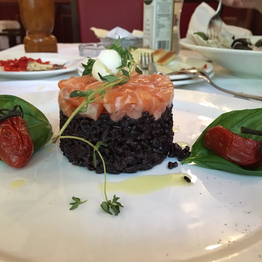 Black risotto with salmon
