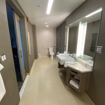 SpringHill Suites by Marriott Tifton - Tons of room in the bathroom for a chair and an assistant. - Hotels Near Me - Tifton, Georgia SpringHill Suites by Marriott Tifton - Tons of room in the bathroom for a chair and an assistant. - Hotels Near Me - Tifton, Georgia