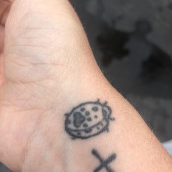 Graffiti Palace Tattoo - "Ladybug" done by this place. Please keep asking "what is that?" - Tattoo Near Me - North Hollywood, California Graffiti Palace Tattoo - "Ladybug" done by this place. Please keep asking "what is that?" - Tattoo Near Me - North Hollywood, California