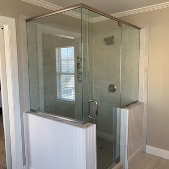 Nick Nelson’s Copper & Pine - a bathroom with a glass shower - Plumbing Near Me Nick Nelson’s Copper & Pine - a bathroom with a glass shower - Plumbing Near Me